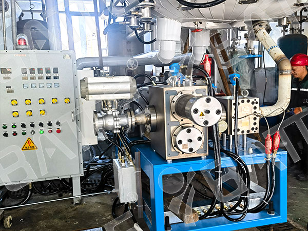 Polymer melt pump and screen changer