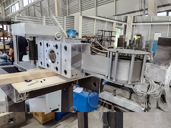 mesh belt screen changer
